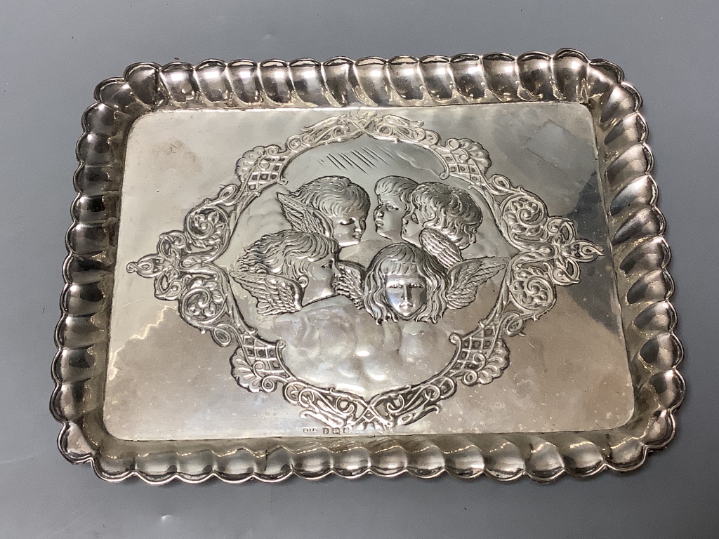 An Edwardian repousse silver dressing table tray with Reynold's Angels decoration, Birmingham, 1905